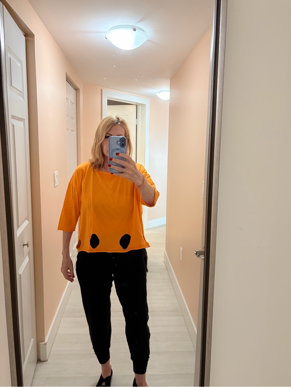 Orange Short Sleeve Women's Tee with cut out Accents